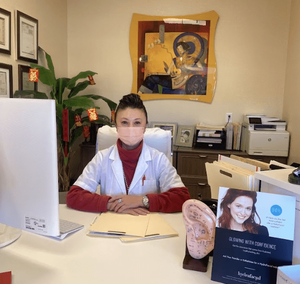 joyce's Happy female doctor at office with patient